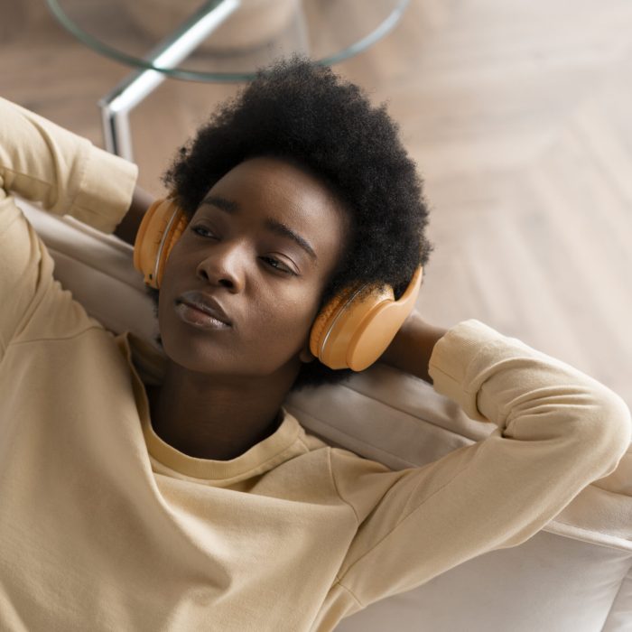 high-angle-woman-wearing-headphones